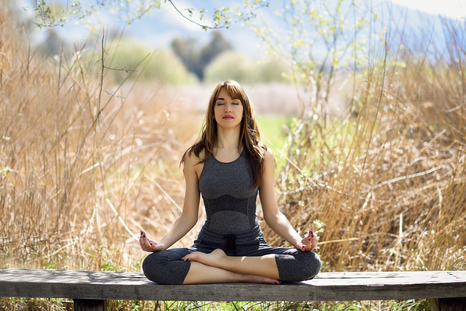 Woman meditating home